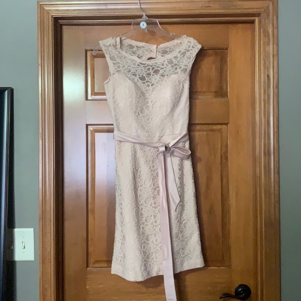 Blush mid length brides made dress